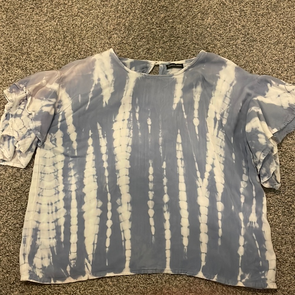 This is a simple, blue/white, tie-dye, Style Envy branded top. Size medium.